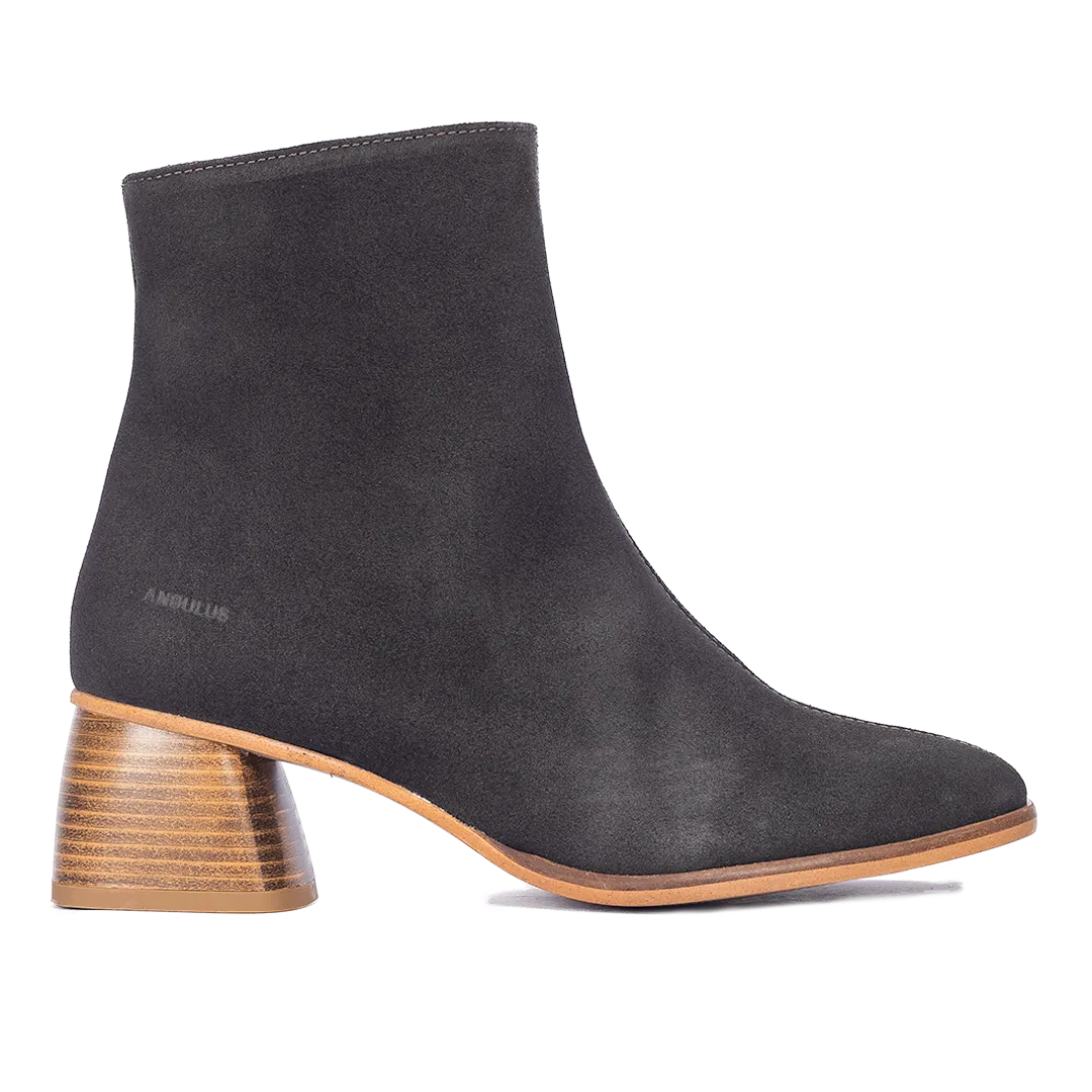 Boot with sculptural wooden heel
