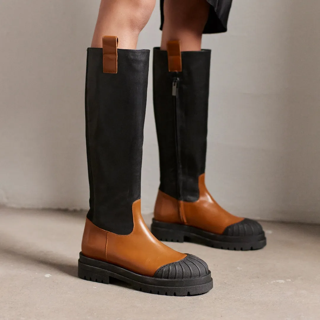 High shaft boot with zipper